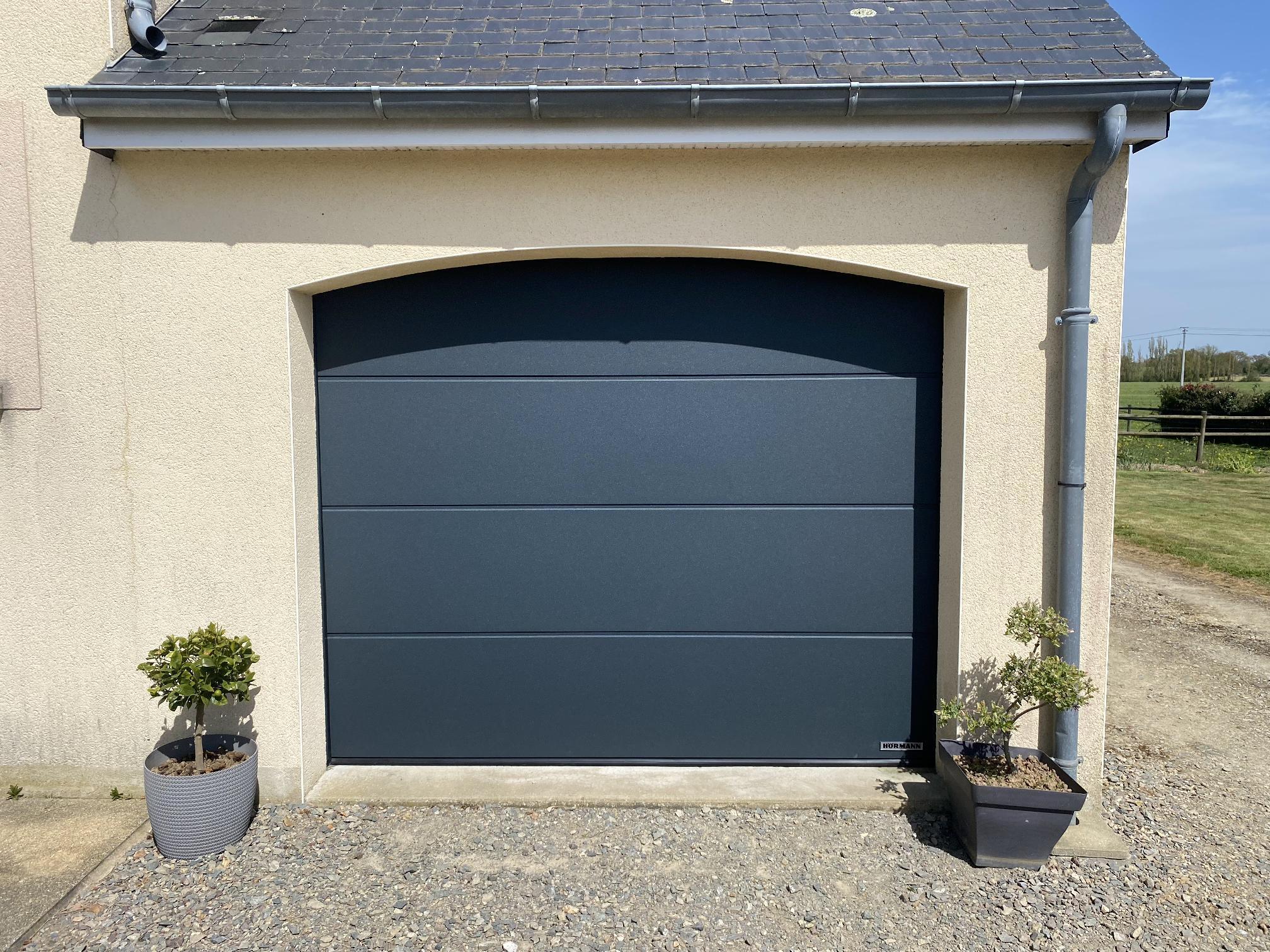 installateur porte de garage change